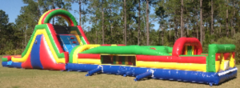 65-Foot rainbow inflatable obstacle course in Daytona Beach, FL